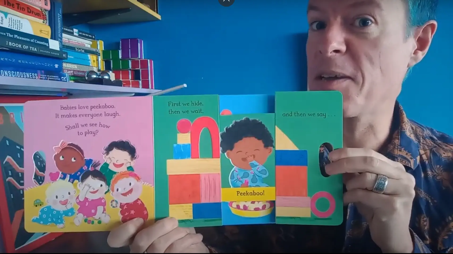 Caspar reading Babies Laugh at Peekaboo