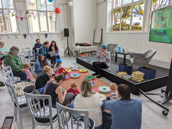 Caspar entertaining babies at Edinburgh Book Festival